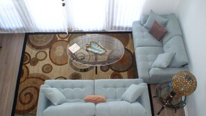 Beautiful, spacious living room with plenty of seating for all