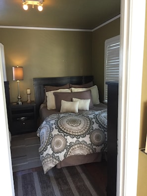 Second bedroom has a queen and twin bed with amazing pillows.