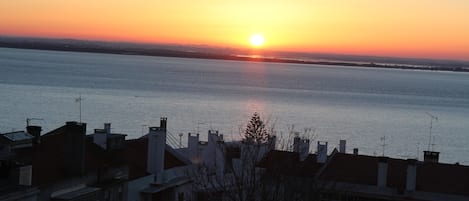 Sun Rise from the back balcony. Bedroom.
