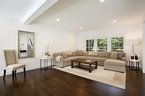 Open Floor Plan Lounging Area With Sonos Sound
