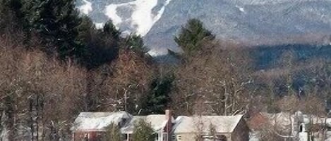 Front of House with Spruce Peak in Distance