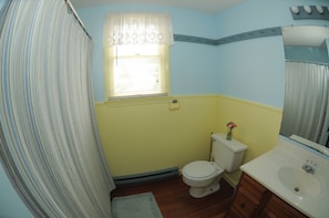 One of two identical full baths on 2nd Floor.