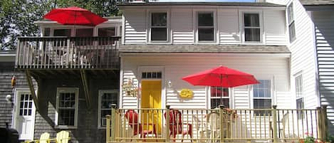 The upstairs apartment and downstairs apartment decks