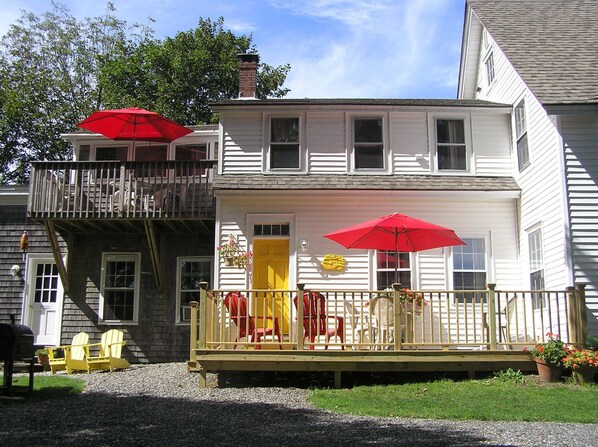 The upstairs apartment and downstairs apartment decks