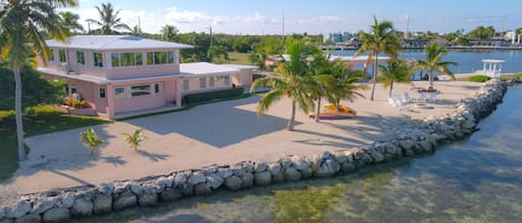 Ariel shot of Layton House, beach and waterfront.