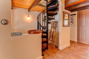 Sturdy spiral stairs to loft w/oak treads , hang wet items on trellis to dry