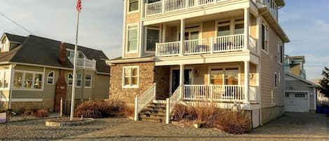 Street view of house from J street. Parking for 5 cars