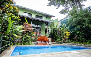 Lush tropical foliage is your backdrop while you spend time in the pool area.