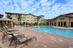 One of two beautiful communal pools with loungers, kids' splash pad, jacuzzi