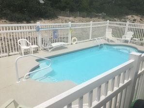 Pool has 3 lounge chairs, & table w/4 straight chairs. No umbrella.