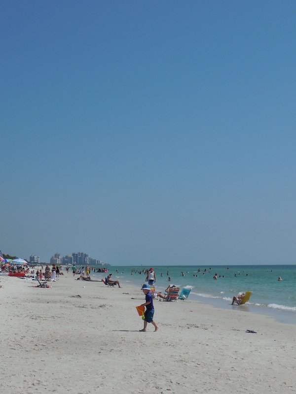 Top rated Vanderbilt Beach with its powder sugar sand is only a 10 minute walk.