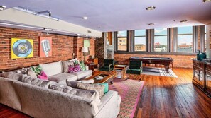 Living room with view of Stadium and River 