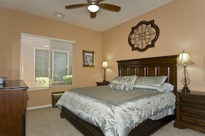 Guest room with King bed, ceiling fan, HD cable tv and ensuite bathroom