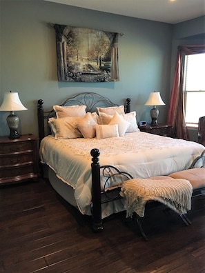 Primary Bedroom with King Bed and private entrance to the backyard