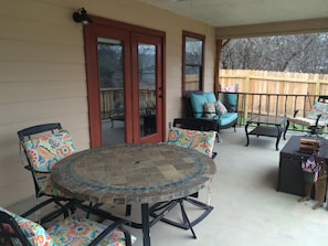 Additional dining space is available on the back porch.