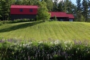 Side view - The Barn Guest House on the left