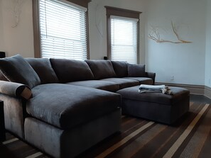 Brand new sleeper sofa sectional transforms into a comfortable queen bed.