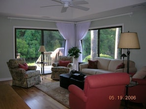 Living room with peaceful lagoon/ bird watching view