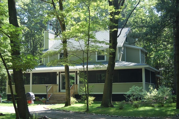 Huge screened in wrap-around porch for plenty of family fun! 