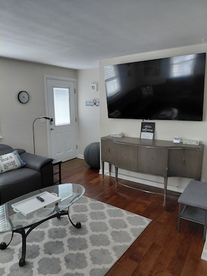 view of living room/front door from kitchen