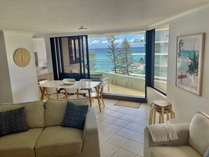 Spacious, light filled living and dining area.