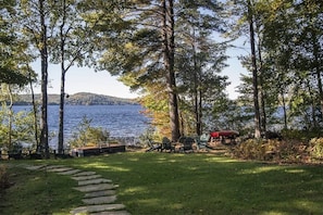 Lawn from main home leading to the lake.