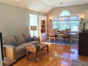 Light and bright living room with sleeper sofa