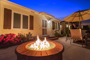 Firepit at night! Shutters are now blue, sorry for the old pic