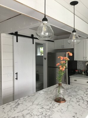 Bright and stocked kitchen