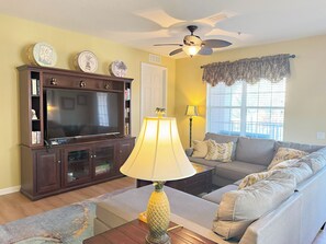 Another view of the living room and entertainment center.