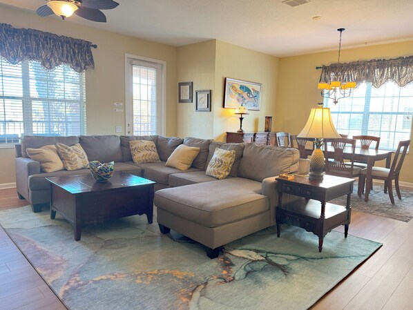 Spacious living room with comfortable sectional couch.