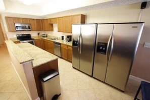 Well equipped kitchen with two refrigerators