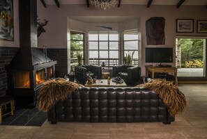 living room with lakeview and fireplace