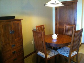 Dining area is great for a meal in or playingcards