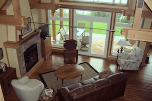 Loft view of living room. Note the Lazy boy leather furniture.