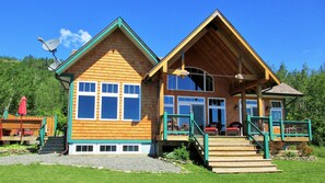 Lakeside of cottage with covered porch for shade or try the sunny side deck! 