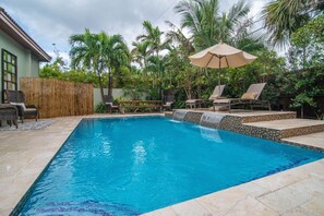 Heated Waterfall pool w marble terraces