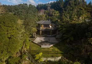 Looking at house from over the lake