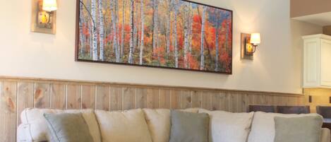 Living Room-With Wood Burning Fireplace and views of Villager Lift and mountain.