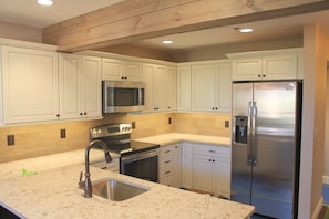 Kitchen-All new appliances and fully stocked for cooking
