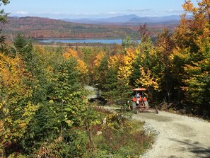 Cherry Pond View and the Mountains during the Fall Color