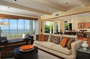 Ocean view open living and dining room.