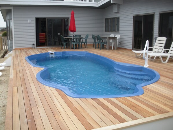 HEATED POOL OFF MASTER BEDROOM AND LIVING ROOM