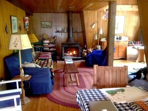 Longer shot of the living room, with woodstove for chilly nights
