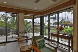 Living room entry out to the lanai (patio)