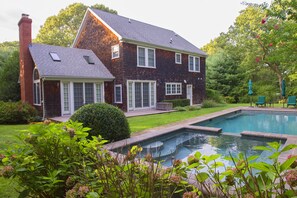 Heated gunite pool and spa.  Spa waterfall flows into pool.