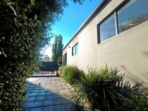 Looking over the pavers to the back door