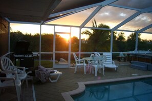 Grill, 2nd table, loungers, spa, pool, sunrise, overlook canal