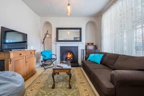 Cosy up with a fire in the cooler months.