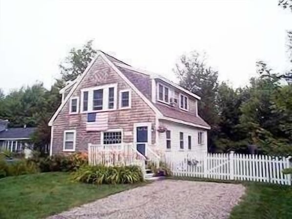 Front of MERE cottage. Driveway has since been widened to accommodate 6 cars
